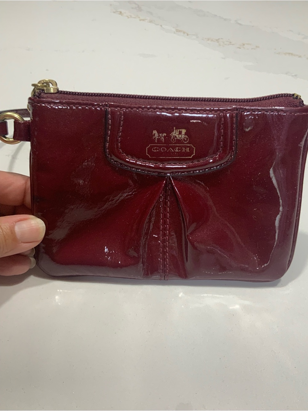 Coach Glossy Patent Leather Wristlet in Wine